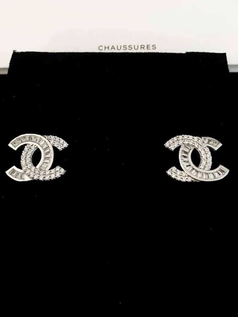 Authentic Chanel stud earrings in 925 sterling silver with white zircon baguette stones luxury jewelry
