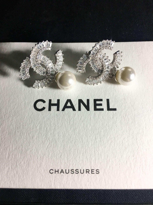 Chanel Jewelry Stud vintage pearl earrings in 925 sterling silver with white zircon baguette stones