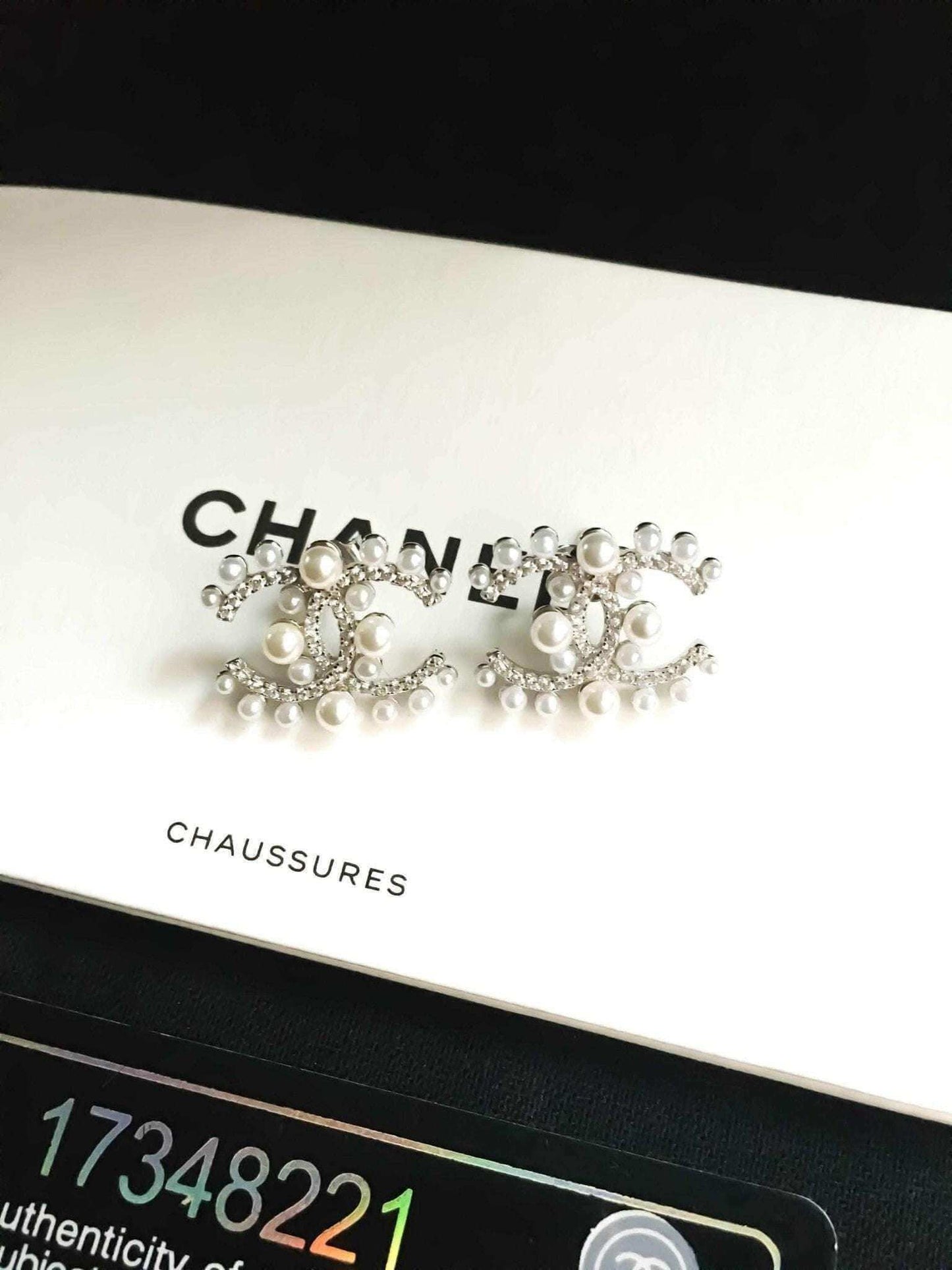 Authentic Chanel Pearl stud earrings in 925 sterling silver with rose gold and imported Italian stones