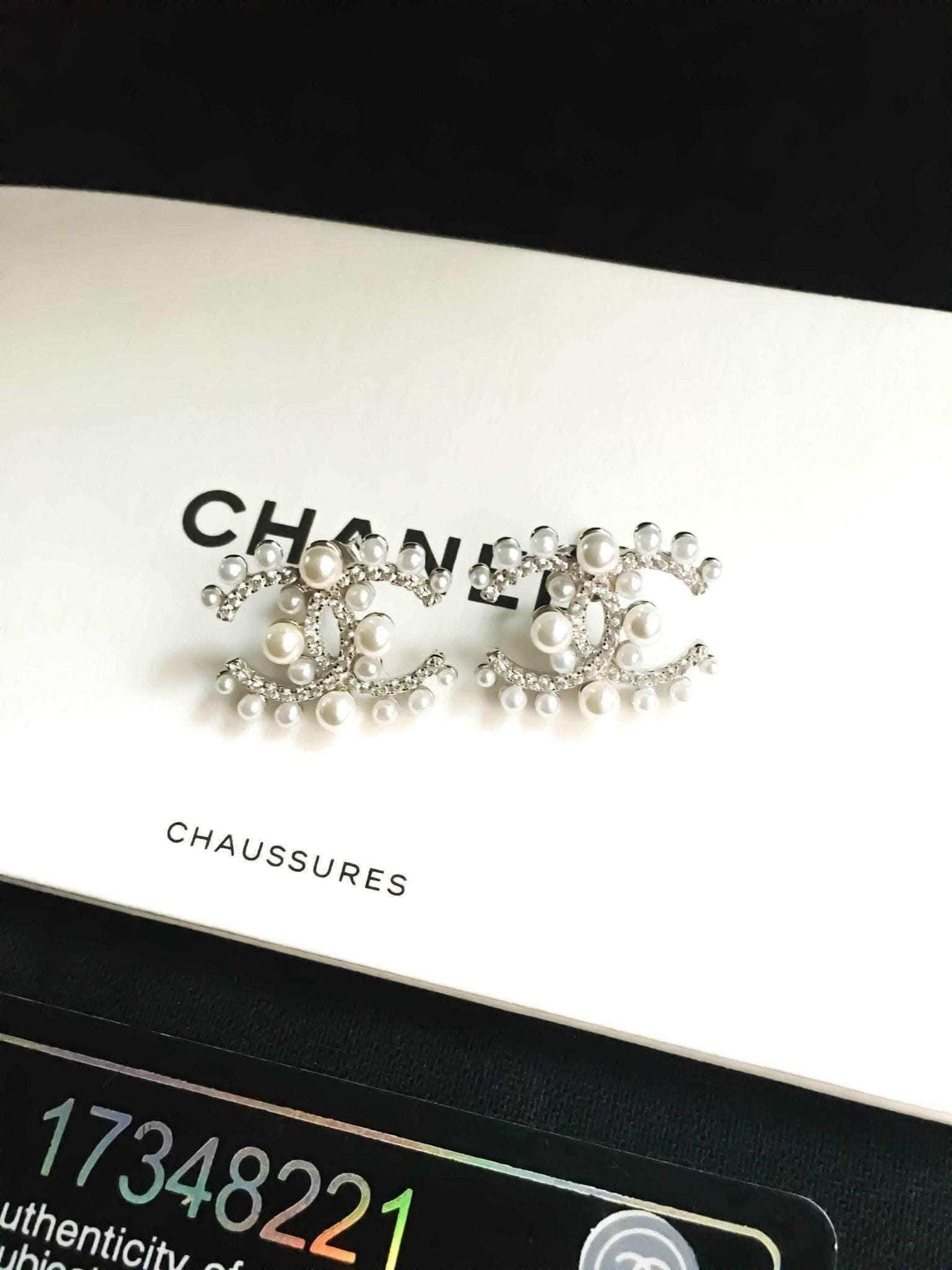 Authentic Chanel Pearl stud earrings in 925 sterling silver with rose gold and imported Italian stones