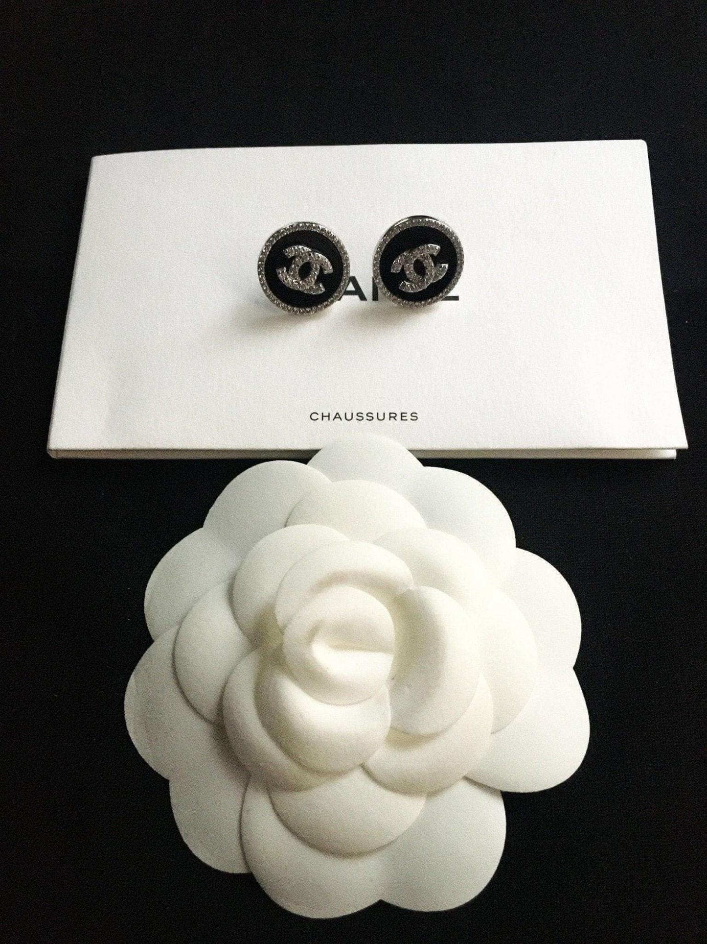 Vintage Chanel Enamel 925 sterling silver earrings with black enamel and baguette stones