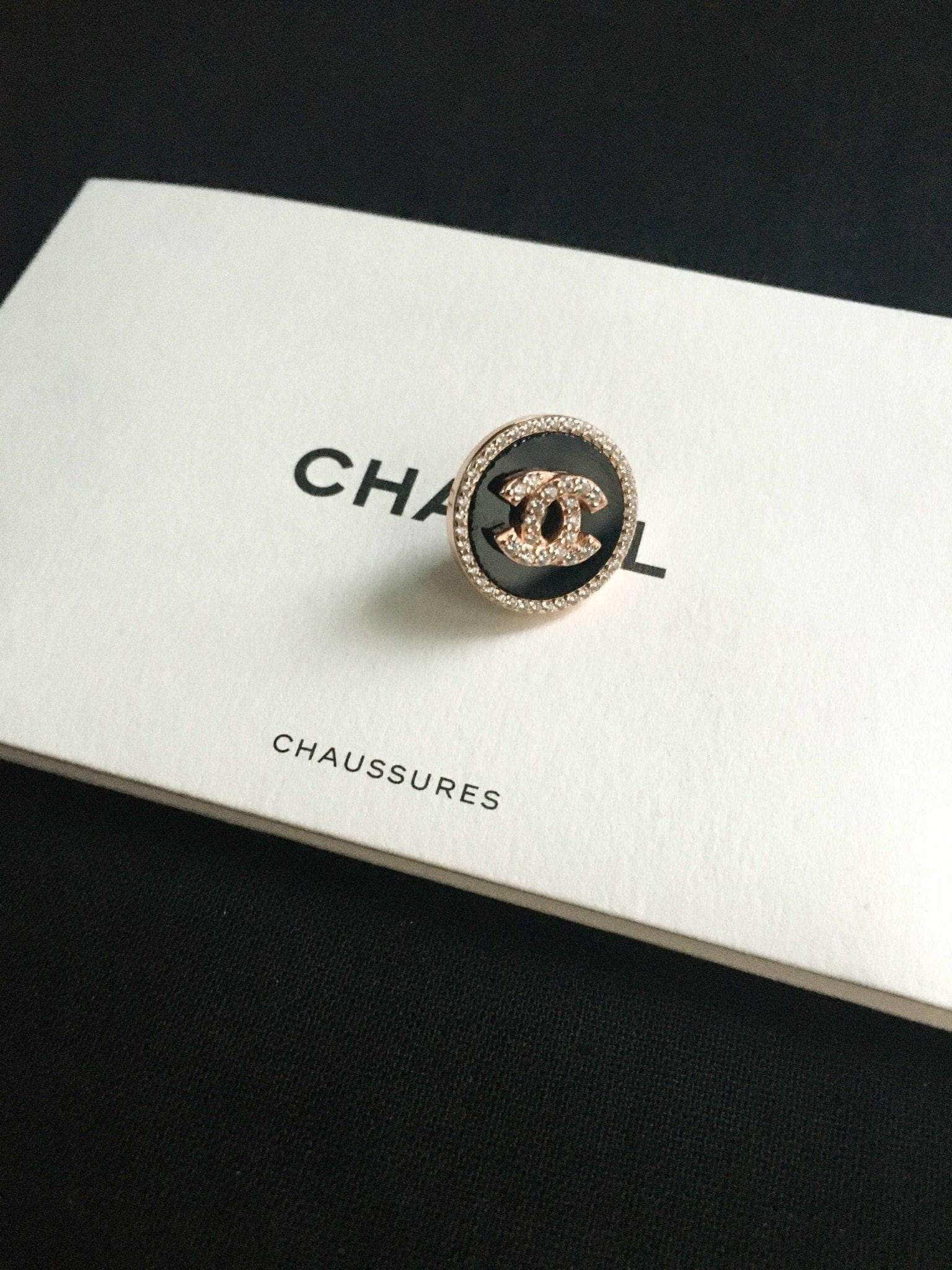 Enamel Chanel vintage rose gold earrings with 925 sterling silver and baguette stones on white Chanel box