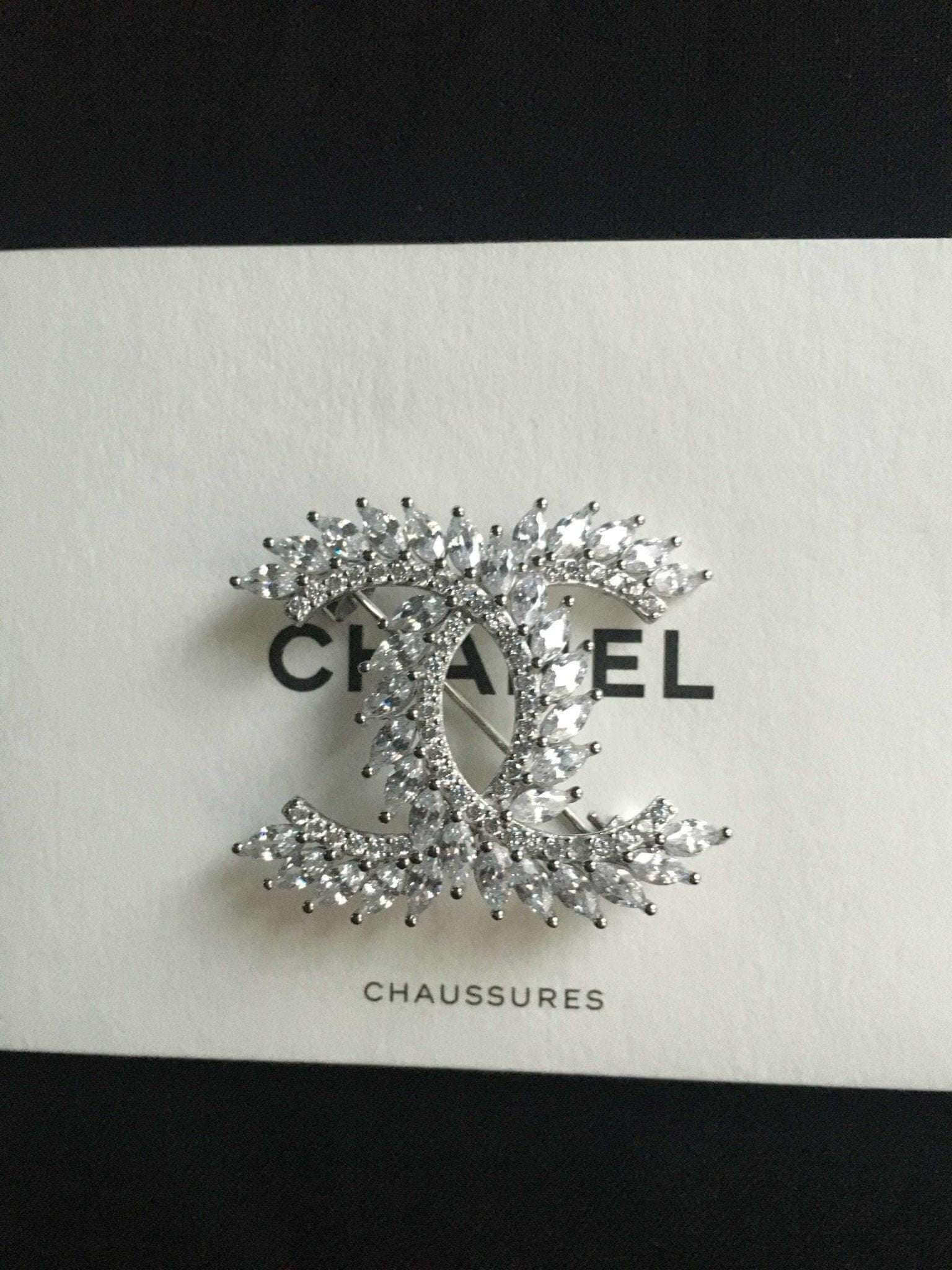 Authentic Chanel brooch 925 sterling silver with baguette stones luxury accessory