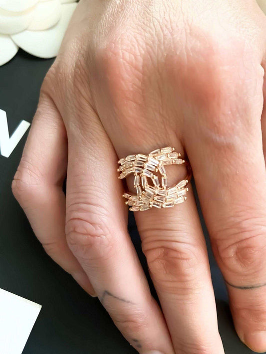 Vintage Chanel rose gold ring with baguette stones in 925 sterling silver on hand