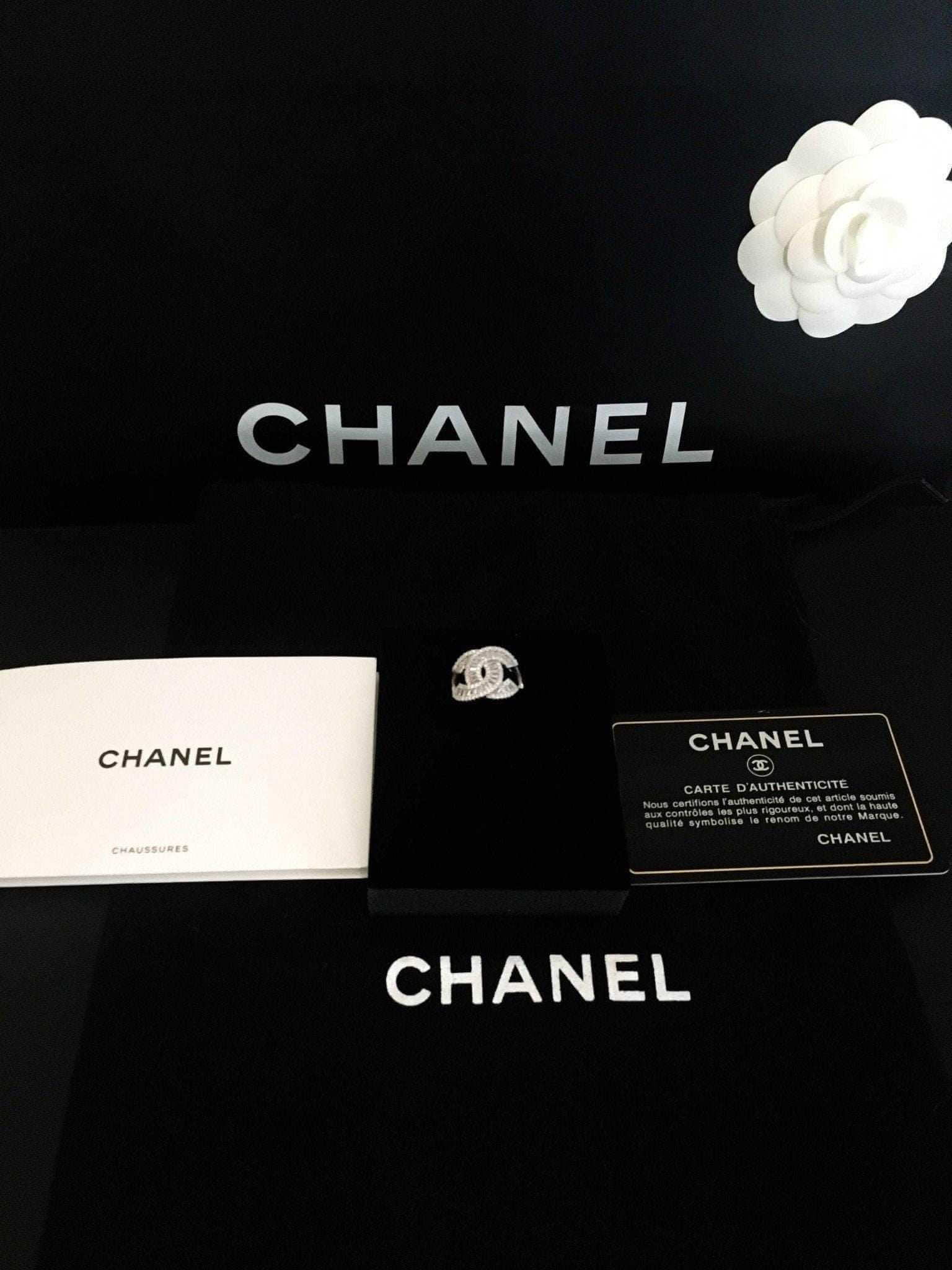 Authentic Chanel 925 sterling silver ring with baguette white zircon stones in luxury packaging