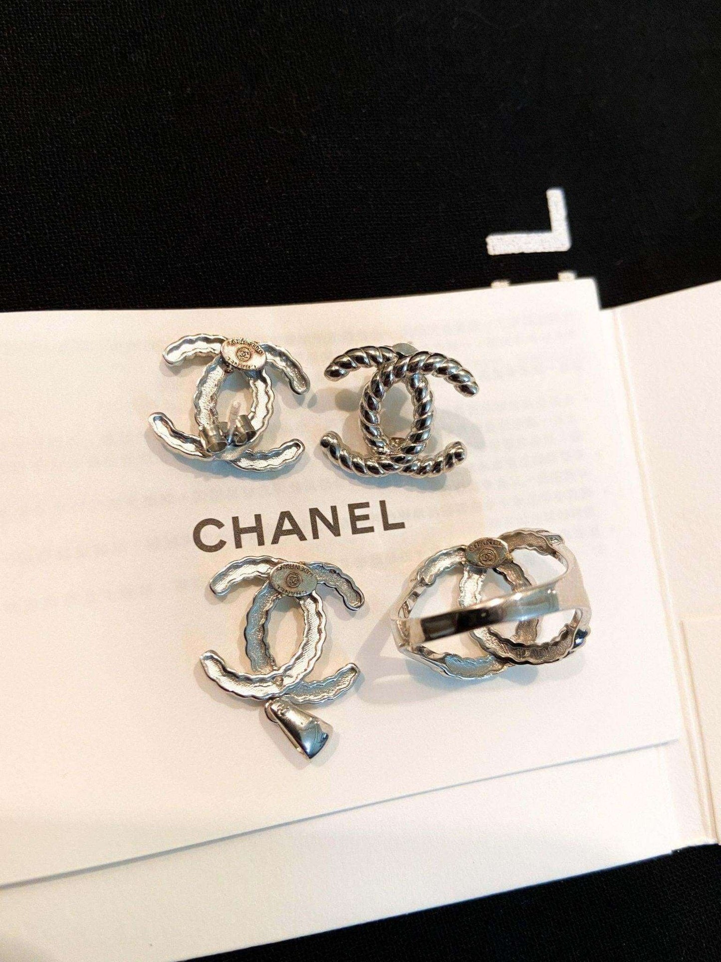 Vintage Chanel Set 925 sterling silver earrings and ring with twisted design on Chanel card