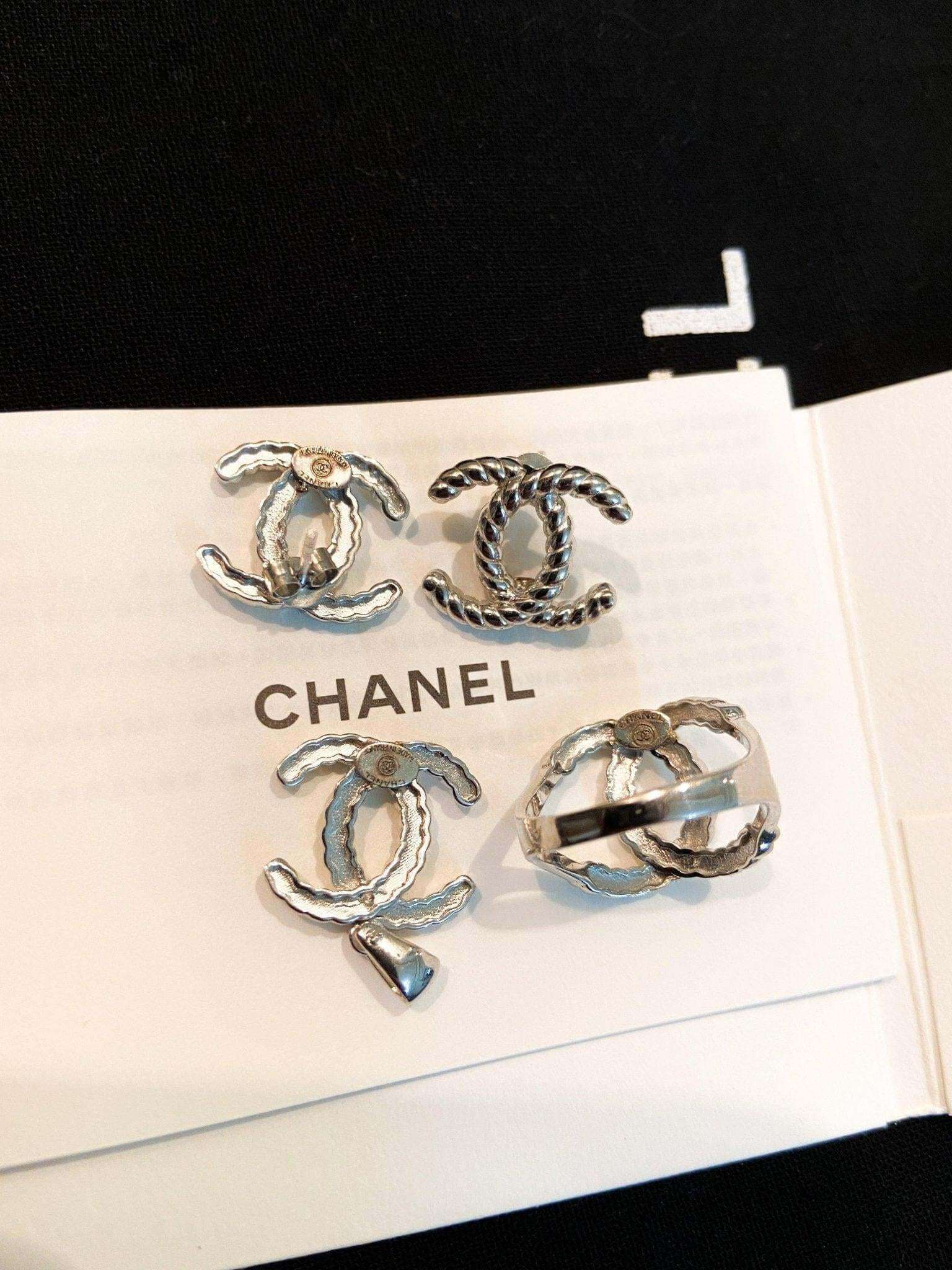 Vintage Chanel Set 925 sterling silver earrings and ring with twisted design on Chanel card
