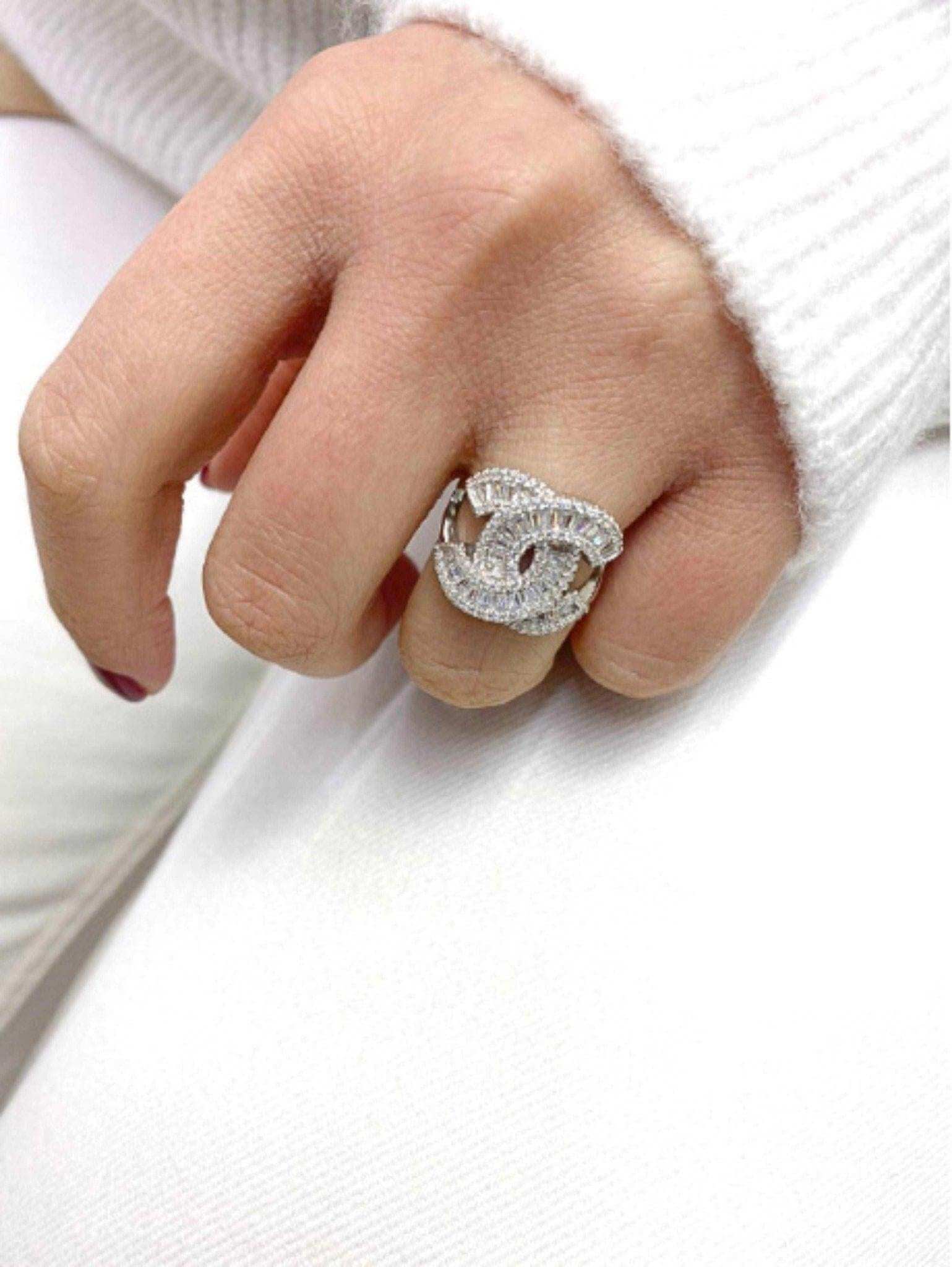 Chanel Vintage Set 925 sterling silver baguette cut ring on hand close-up