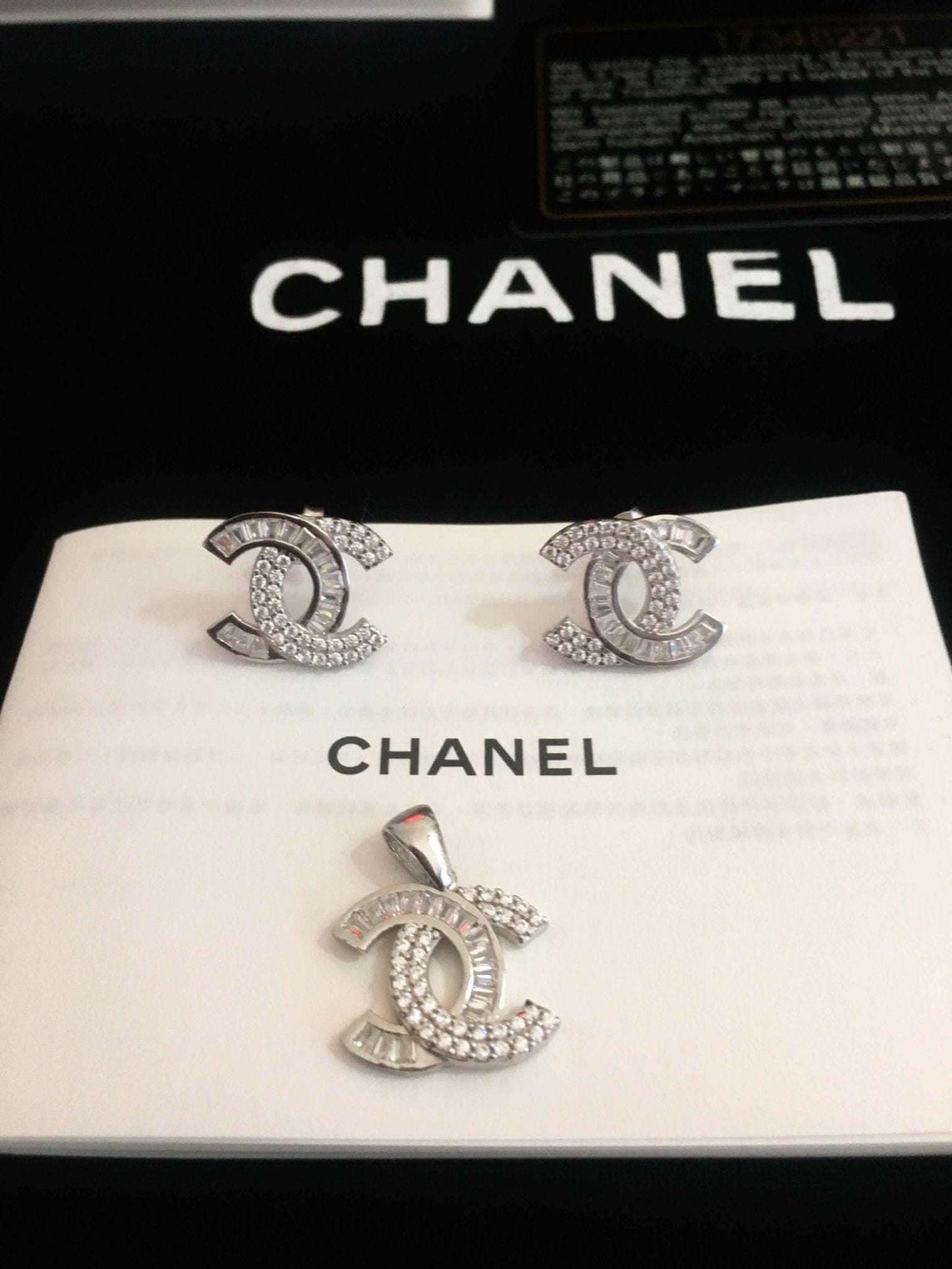 Chanel Jewelry 925 Sterling Silver set with baguette stones and authentic logo design