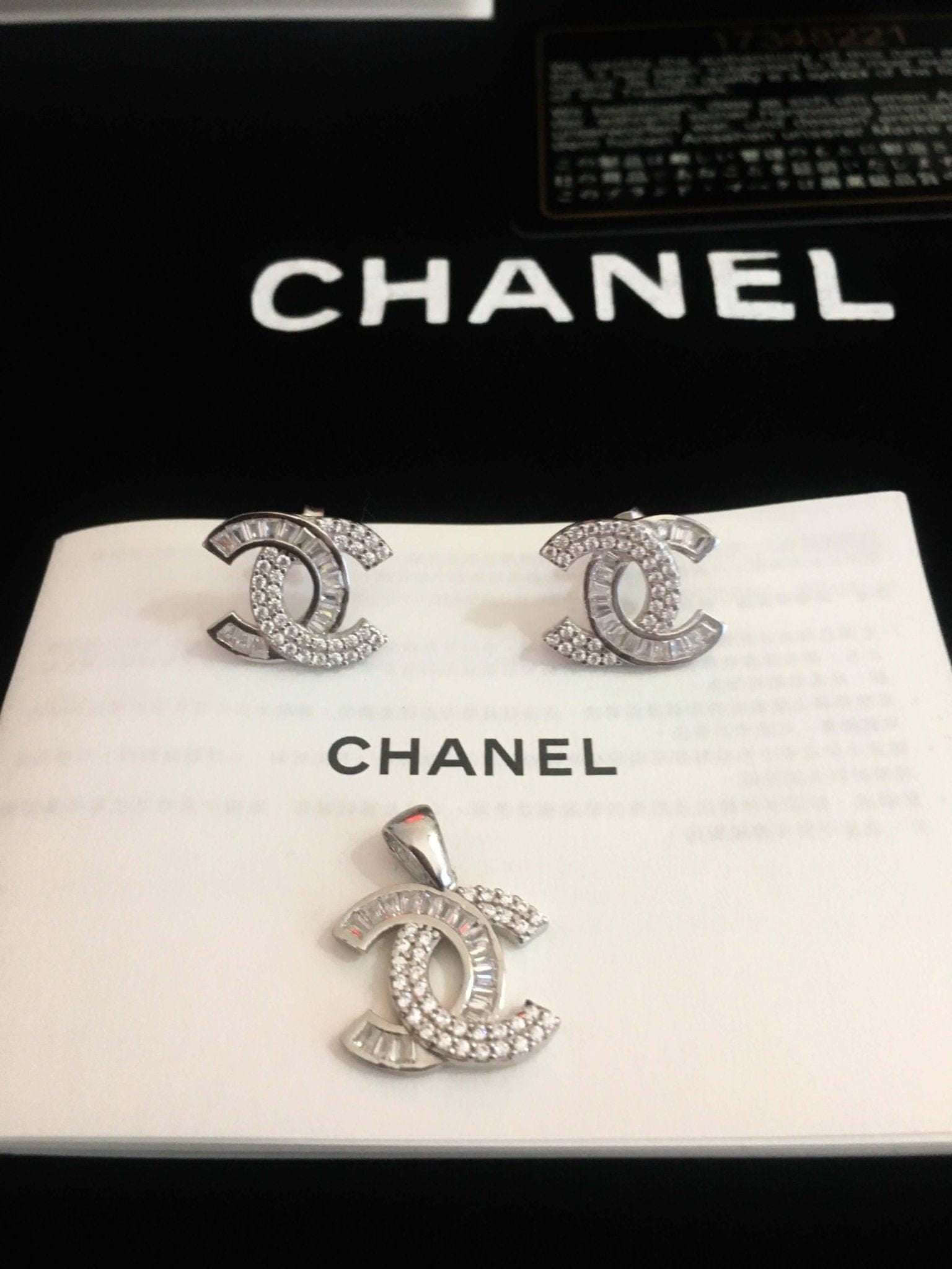 Chanel Jewelry 925 Sterling Silver set with baguette stones and authentic logo design