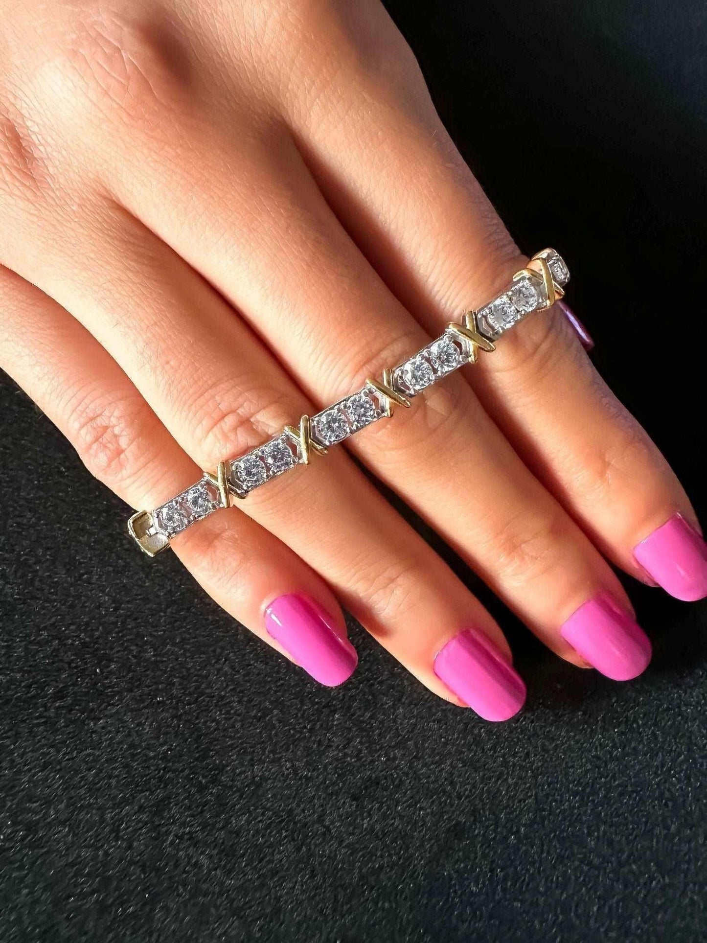 925 sterling silver luxury Tiffany Co bracelet on hand with pink nail polish