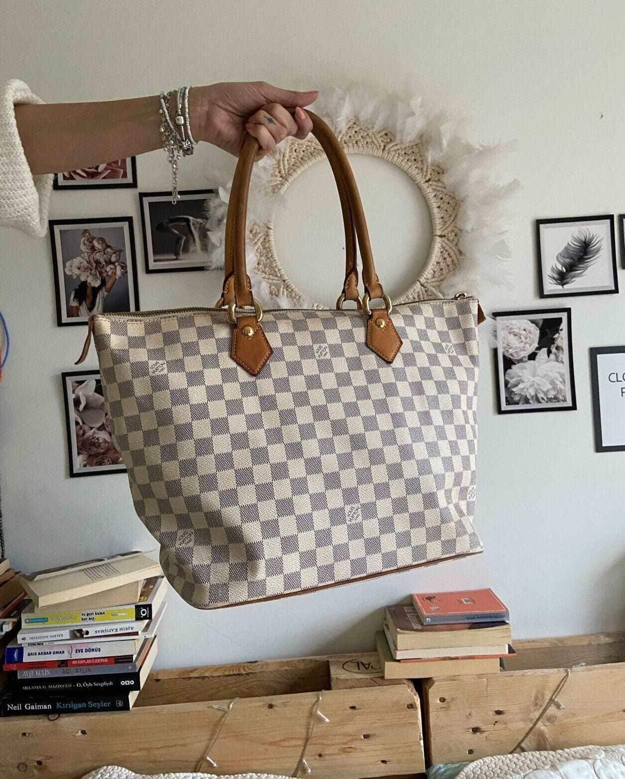 Louis Vuitton Damier Azur Saleya MM tote bag with checkered pattern and tan leather handles