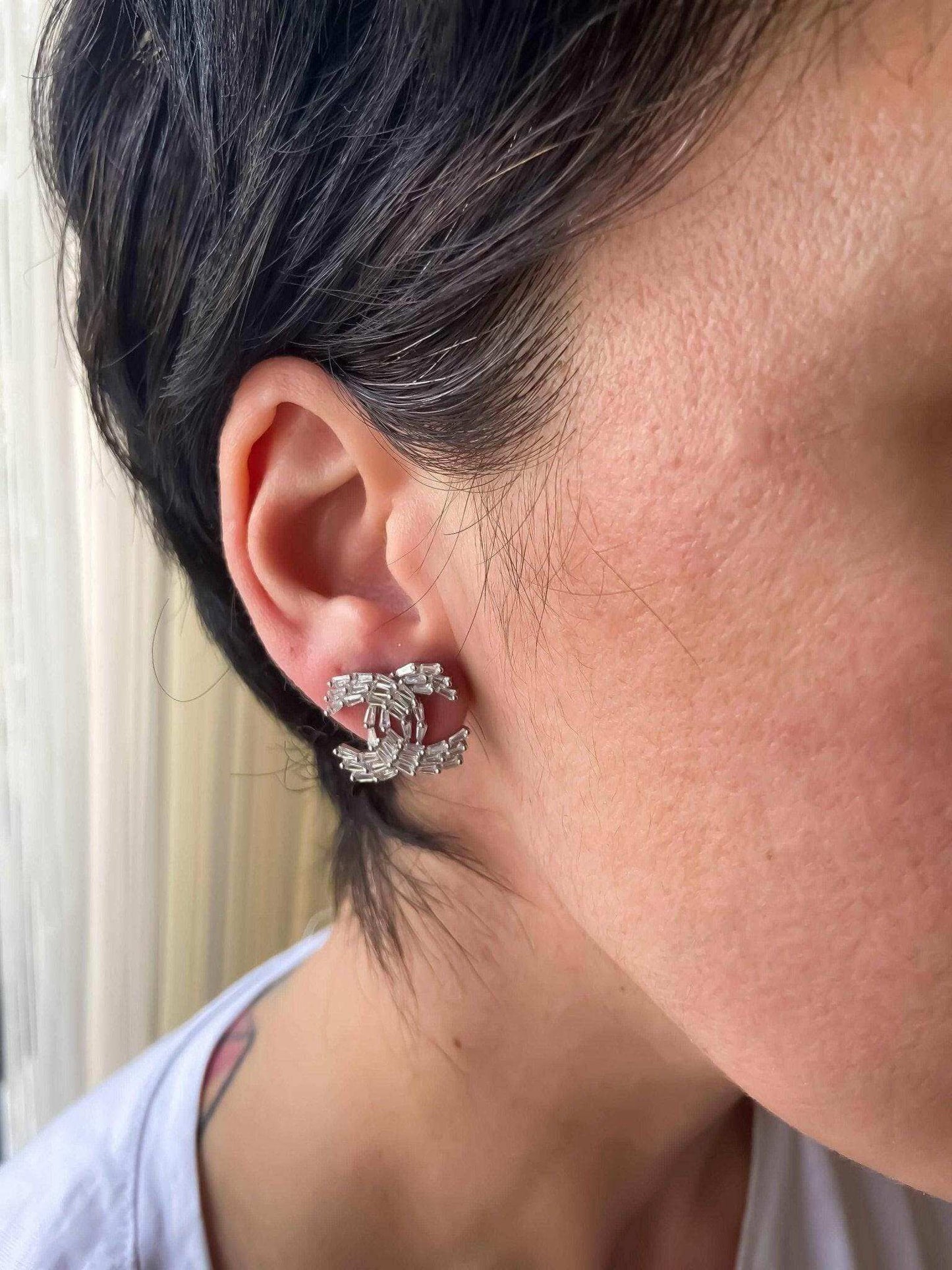 Chanel baguette vintage earrings in 925 sterling silver with Italian stones worn on ear