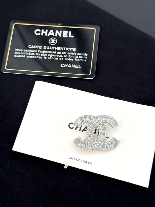 Chanel brooch 925 sterling silver with sparkling zirconia stones and iconic logo accessory