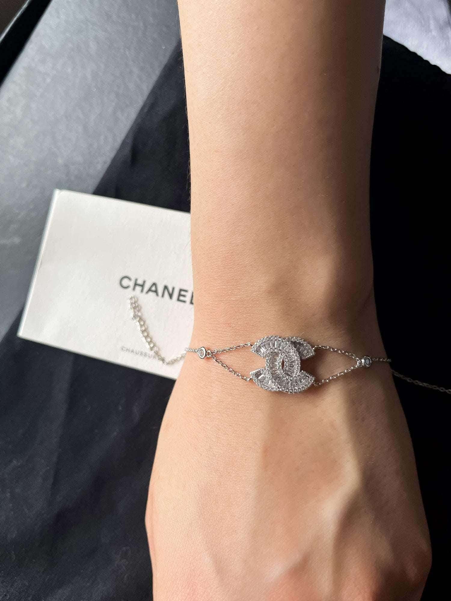Chanel vintage jewelry silver bracelet with baguette cut zircon stones on wrist