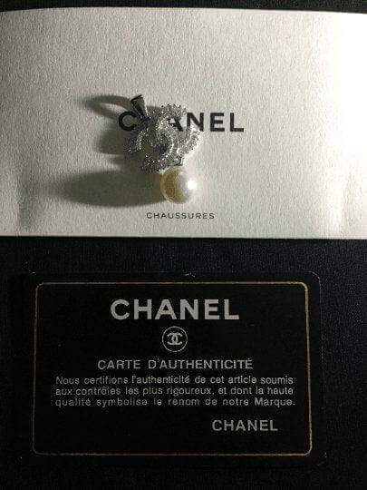 Authentic Chanel Jewelry 925 sterling silver necklace with pearl and baguette stones on authenticity card
