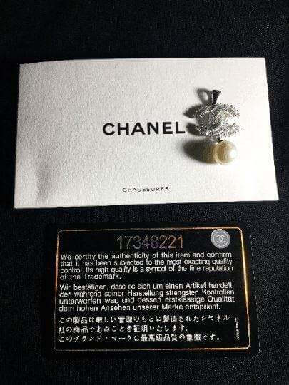 Authentic Chanel Jewelry 925 sterling silver pearl necklace with Italian baguette stones and signature packaging