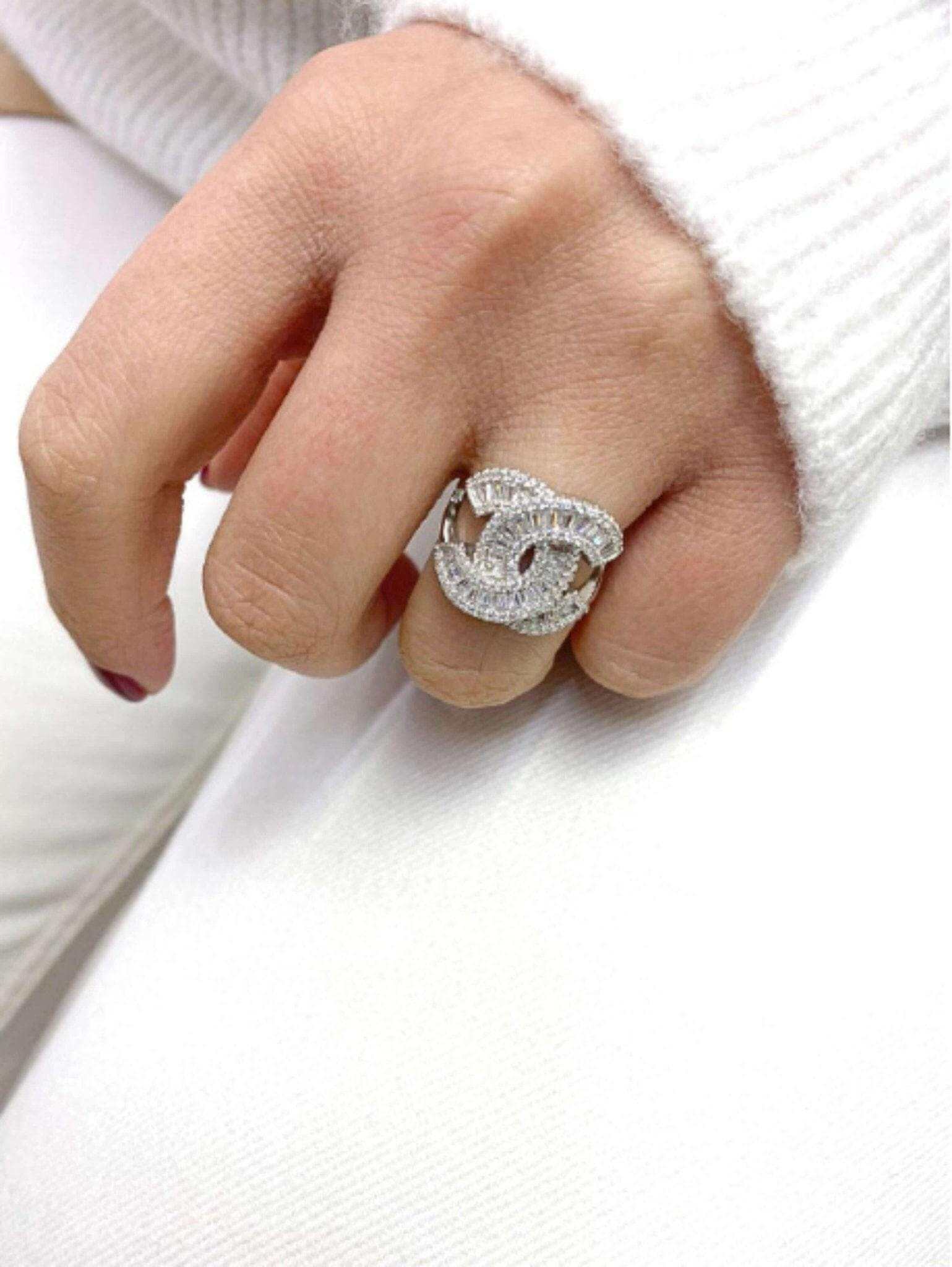 Authentic Chanel ring in 925 sterling silver with white zircon baguette stones on hand