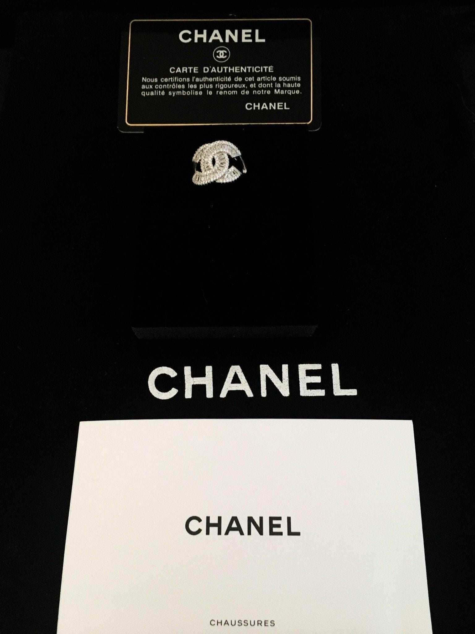 Authentic Chanel ring in 925 sterling silver with white zircon baguette stones and Chanel authenticity card