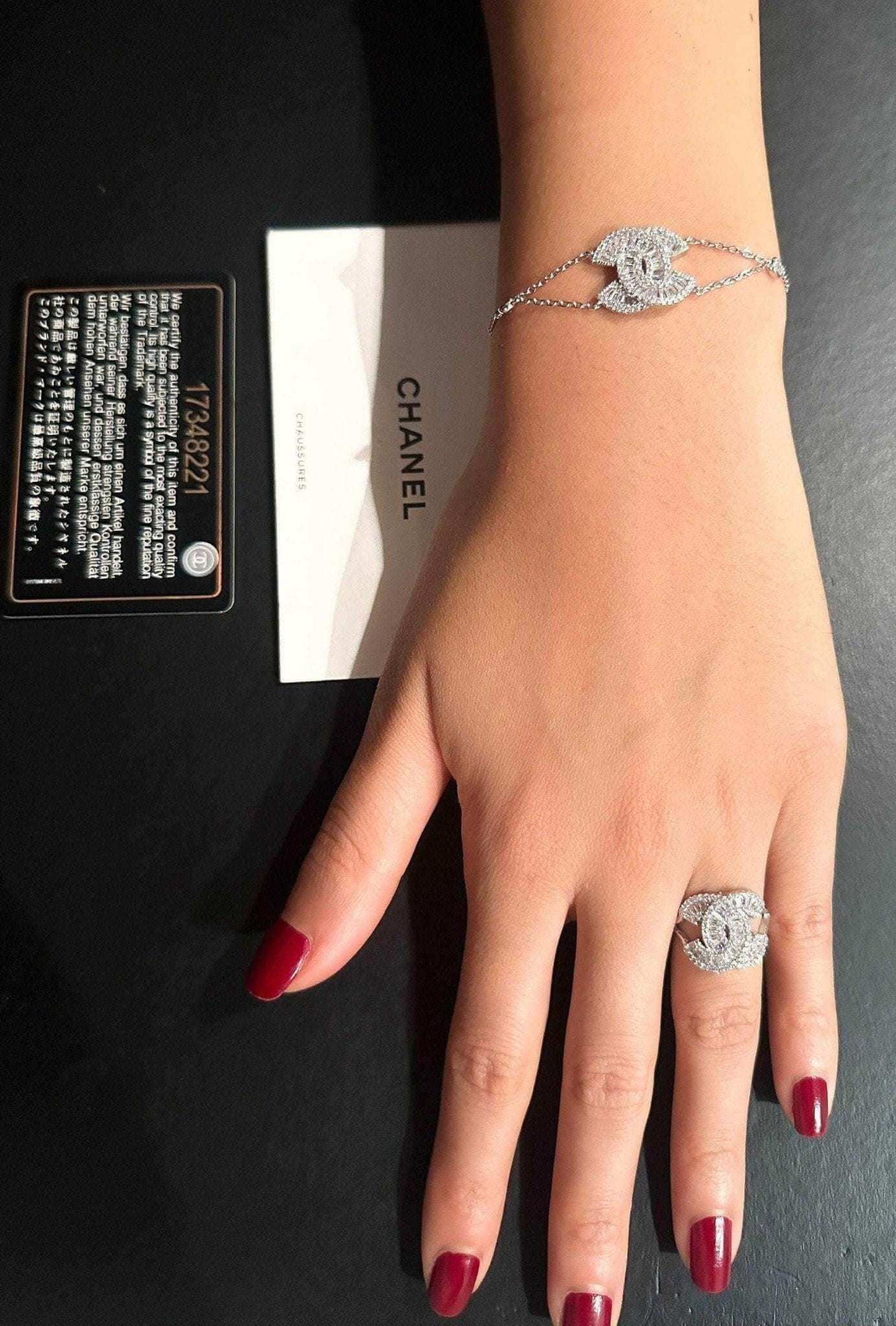 Authentic Chanel ring 925 sterling silver with baguette stones on hand