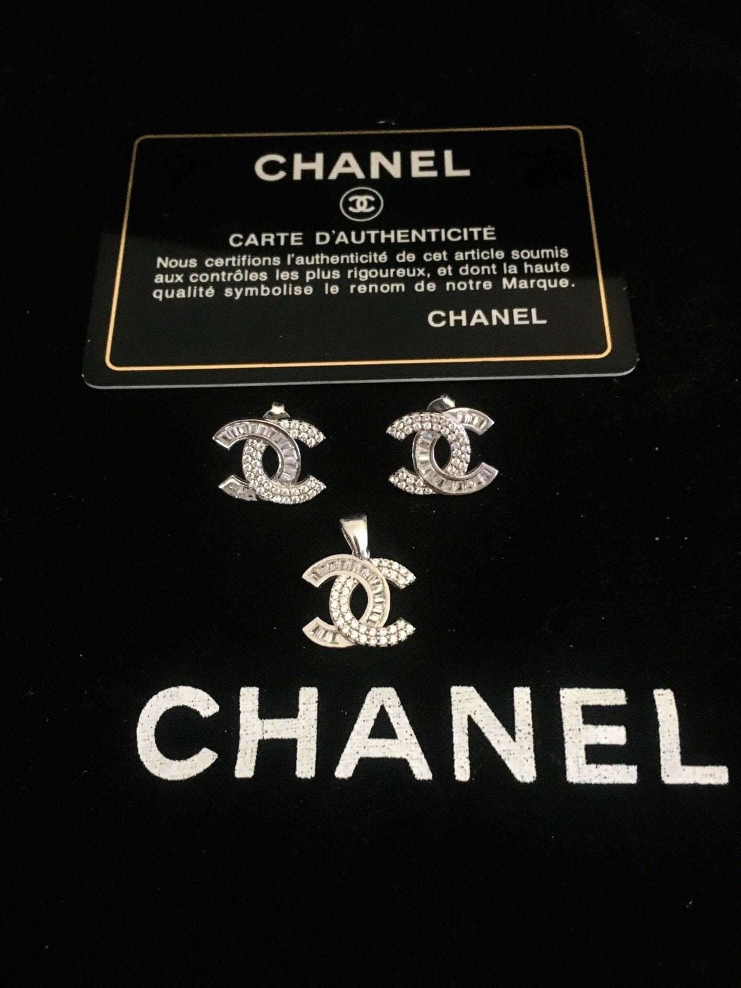Chanel Jewelry 925 sterling silver set with baguette stones and authenticity card