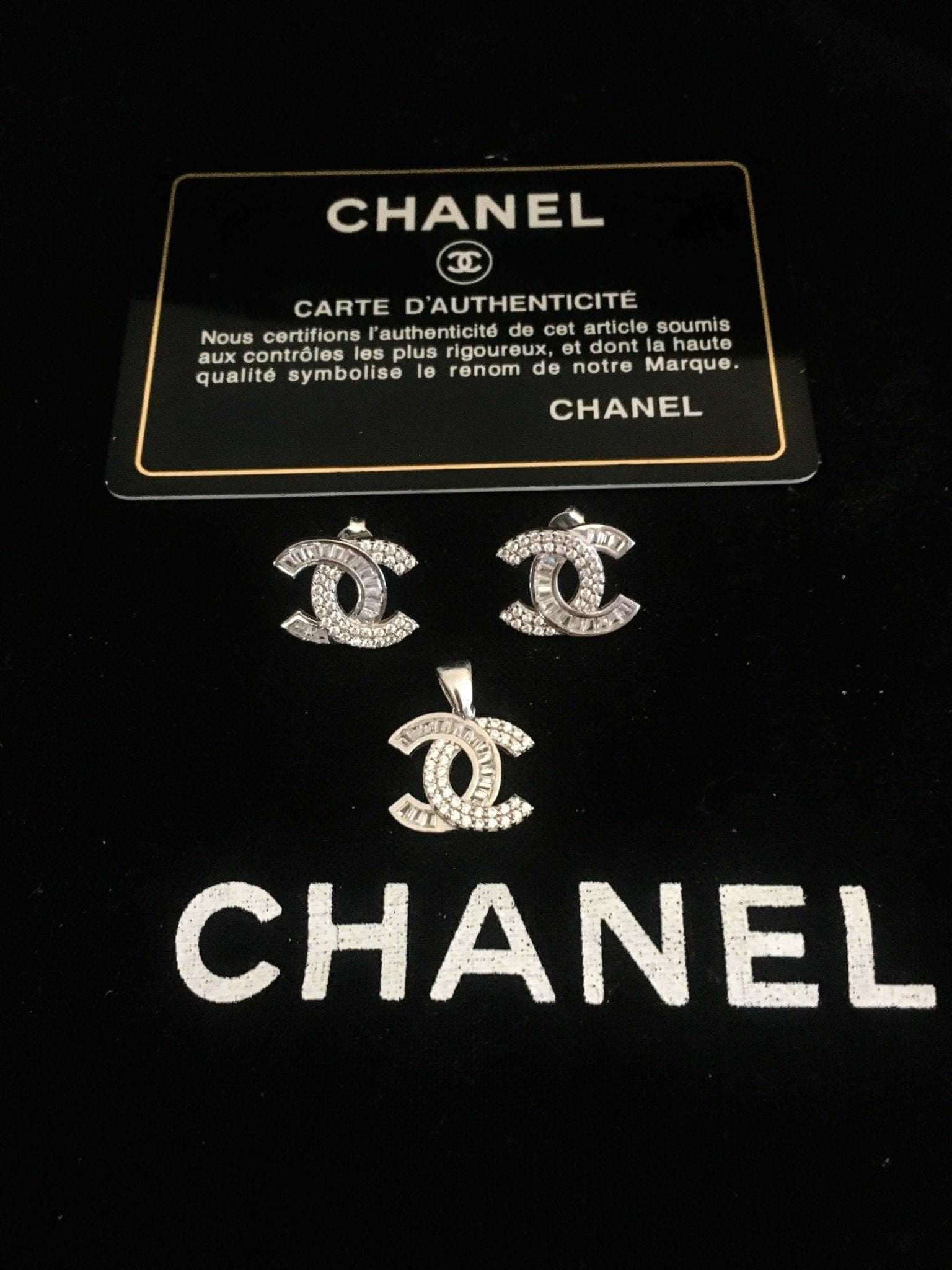 Chanel Jewelry 925 sterling silver set with baguette stones and authenticity card