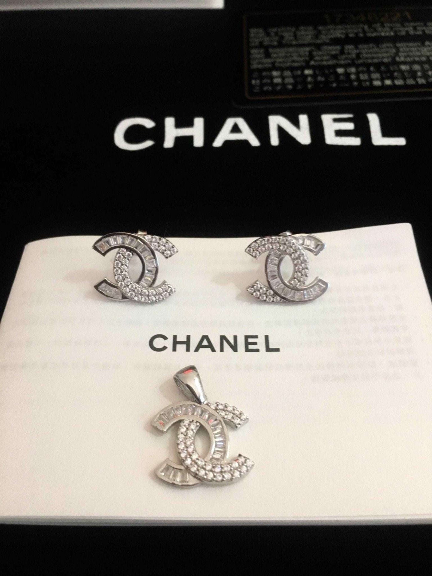 Chanel Jewelry 925 sterling silver set with baguette stones and logo design