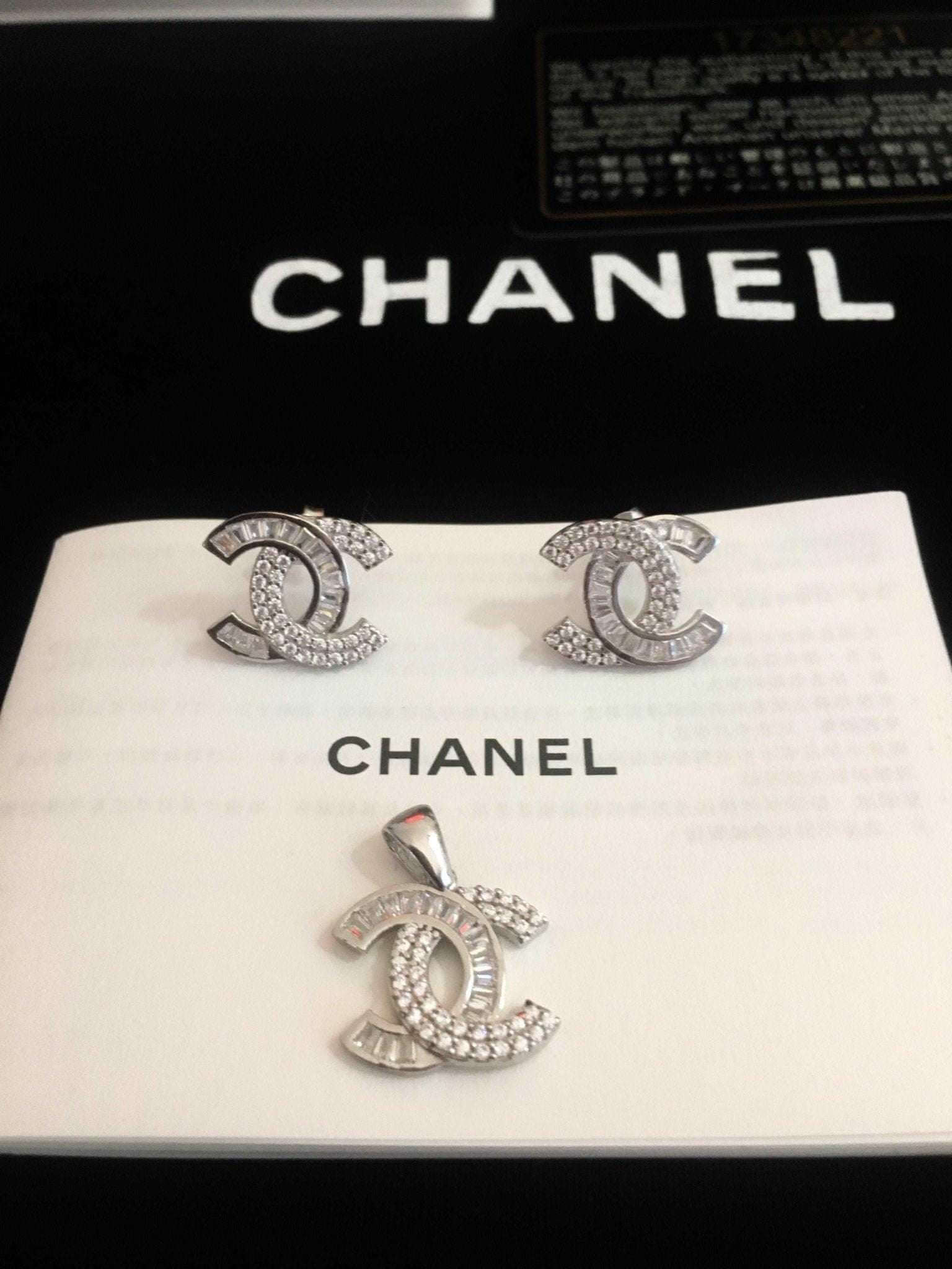 Chanel Jewelry 925 sterling silver set with baguette stones and logo design