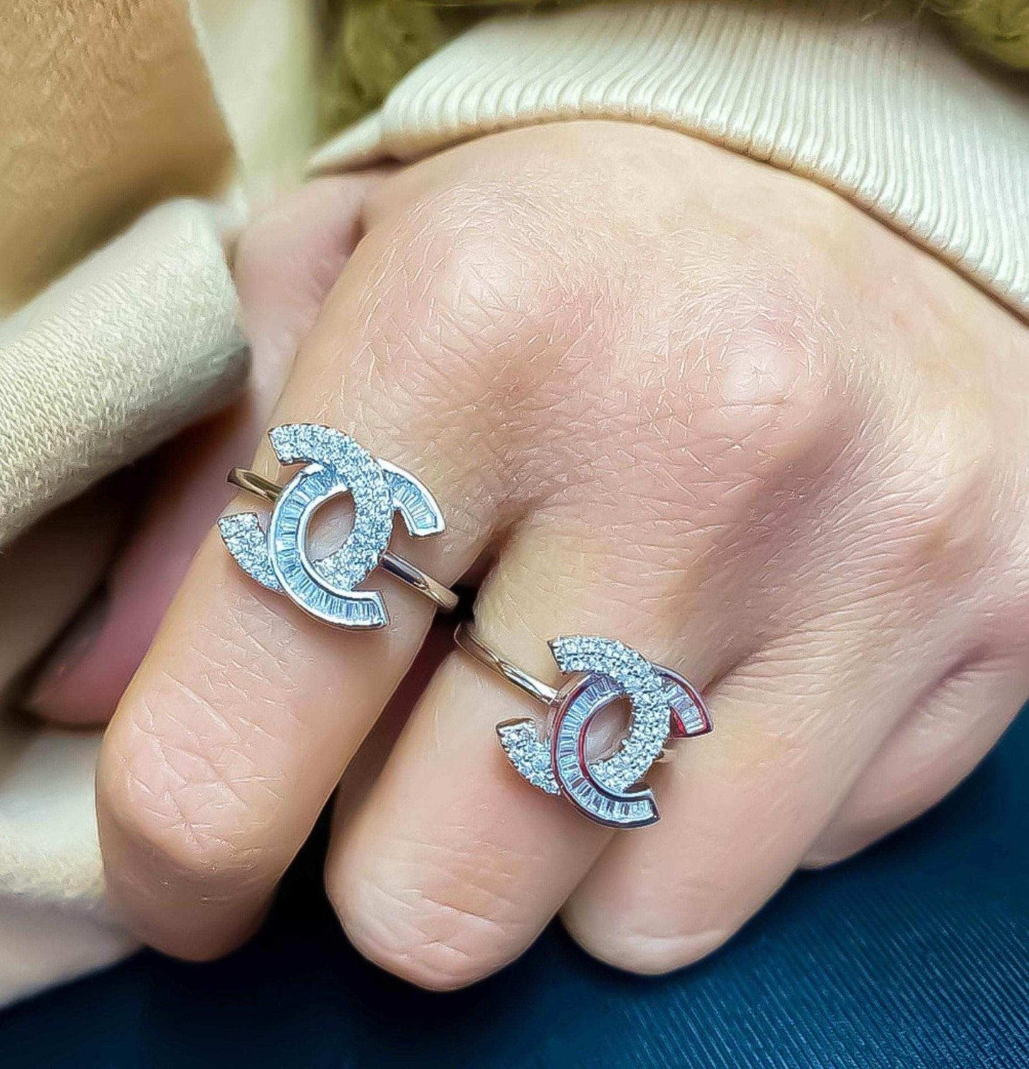 Chanel Jewelry 925 sterling silver ring set with baguette stones on hand