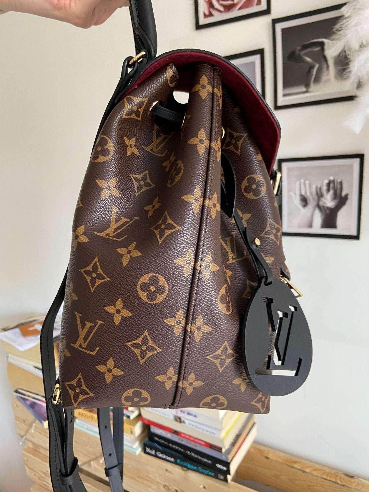Louis Vuitton Monogram MONTSOURIS Backpack in brown with LV logo and floral pattern, luxury designer bag