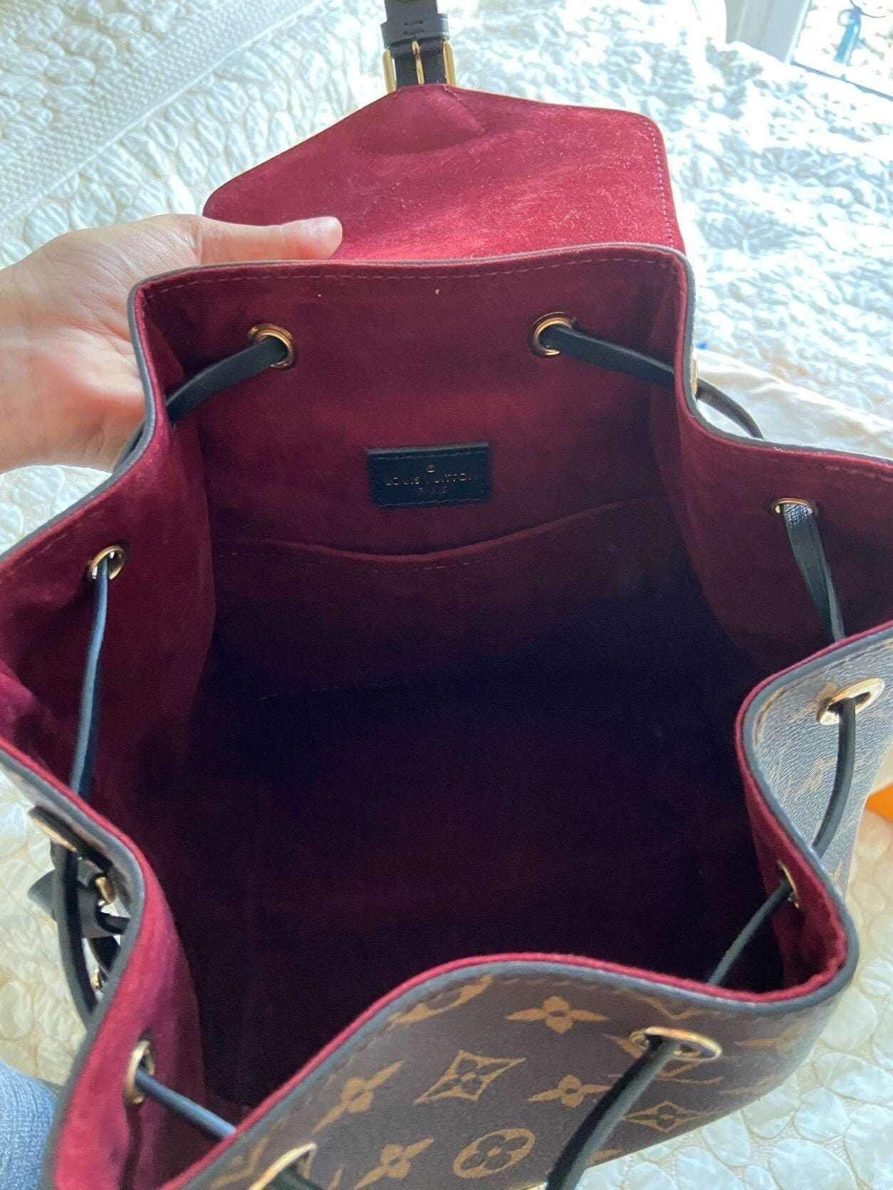 Louis Vuitton Monogram Montsouris Backpack open interior with burgundy lining and monogram canvas exterior