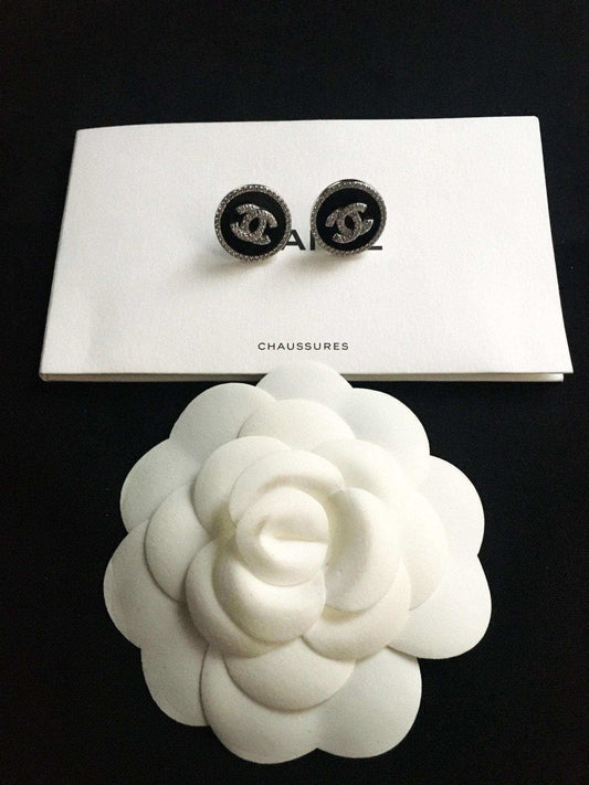 Vintage Chanel Enamel 925 sterling silver earrings with black enamel and baguette stones