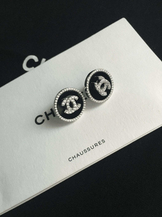 Vintage Chanel enamel 925 sterling silver earrings with baguette stones and white zircon detail